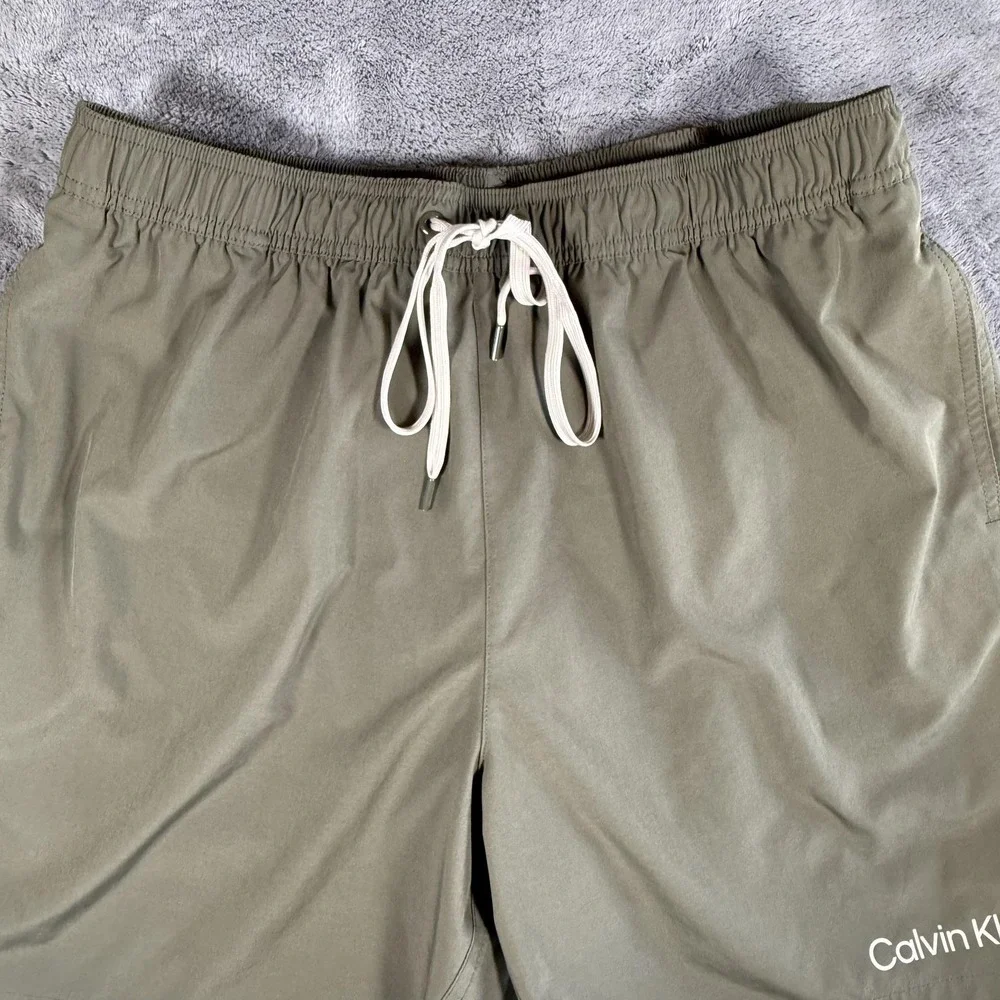 Calvin Klein Swim Shorts Mens Size XL Green Repreve Stretch Lined Trunks